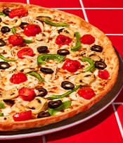 A garden's worth of vegetables. Mushrooms, onions, crisp green peppers, grape tomatoes and black olives.