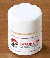 Order Parmesan & Romano Grated Cheese Mini Shaker food online from Pizza Hut store, Wadsworth on bringmethat.com